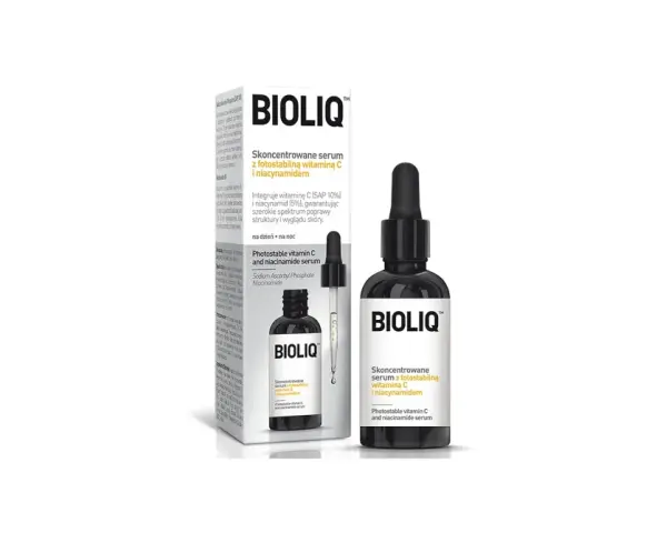 Butelka z czarnym pipetą i opakowanie z serum Bioliq z witaminą C i niacynamidem.